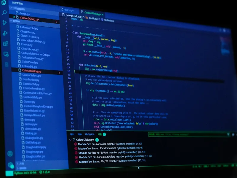 Monitor showing a code editor with a Python project open